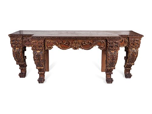 A George II Style Carved Mahogany and Parcel-Gilt Console Table
Height 38 x width 96 x depth 8 1/2 inches.