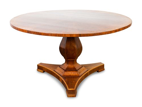 A Regency Style Inlaid Mahogany  Tilt-Top Center Table
Height 26 x diameter 48 inches.