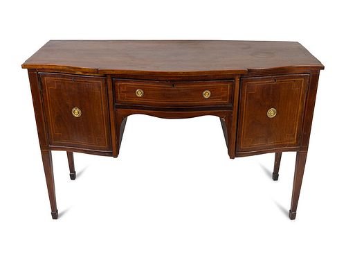 A Federal Style Satinwood and Ebony-Inlaid Mahogany Sideboard
Height 35 x length 53 3/4 x depth 21 1/4 inches.