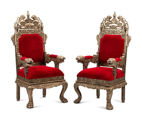 A Pair of Indian Style Silver-Clad Armchairs
Height 56 1/2 x width 27 x depth 23 inches.