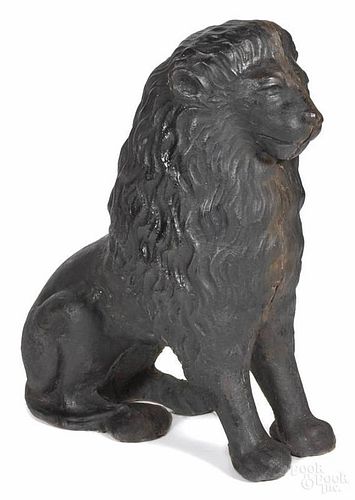 Cast iron garden figure of a lion, 29'' h.