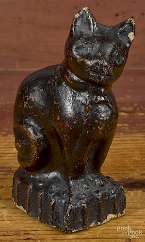 Earthenware figure of a seated cat, 19th c., 5''