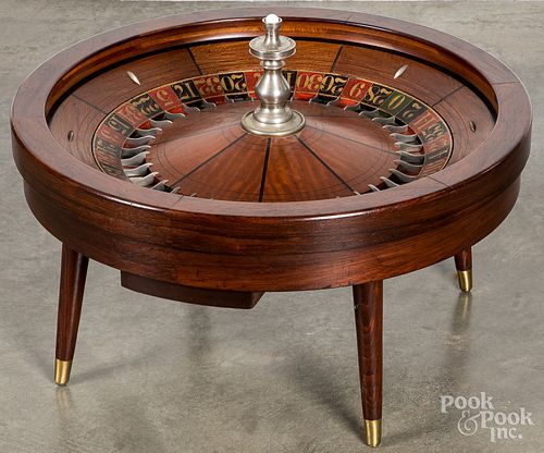 Roulette wheel coffee table by L. Rube