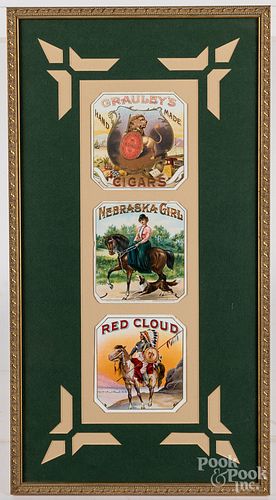 Three framed cigar labels