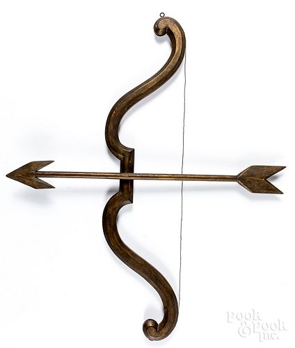 Carved and painted bow and arrow, early 20th c.