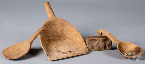 Three wooden scoops, together with a butterprint