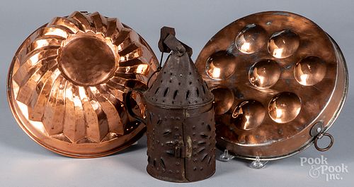 Two copper pan molds, together with a tin lantern