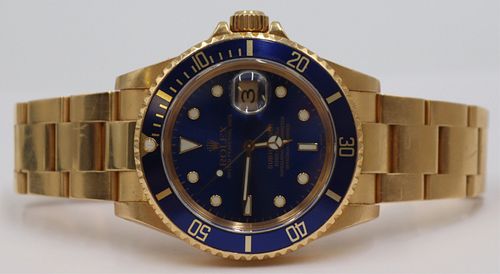 JEWELRY. Rolex 18kt Oyster Perpetual Submariner