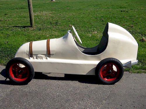A factory-built childs' pedal-car of the famous pre-war "Twin-cam" 750 racer c1947; restored usable