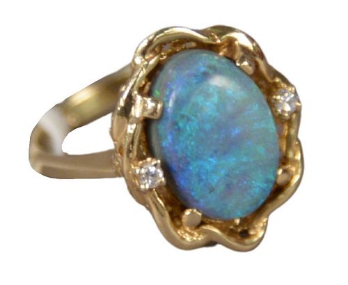 14 Karat Gold Ring, having oval opal and 2 small diamonds, size 6 1/4, 5.8 grams.