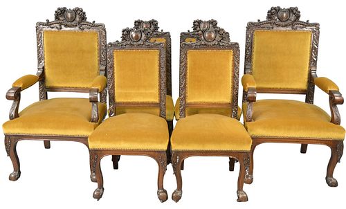 Set of Six Carved Oak Dining Chairs, to include two arm, four side, attributed to Horner, armchair height 47 inches, width 26 inches, depth 24 inches.