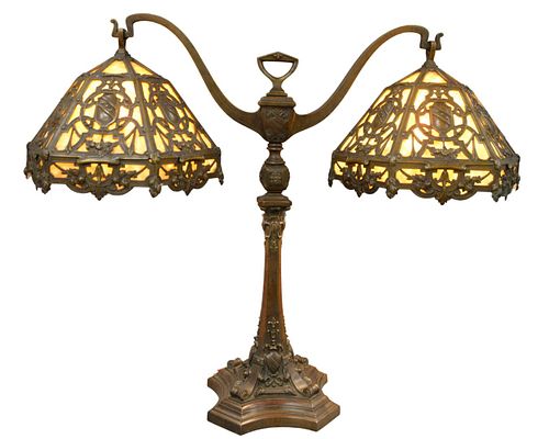 Large Duffner and Kimberly Bronze Double Student Lamp, having caramel slag glass six panel shades with bronze shield decoration, height 34 inches, wid