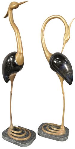 Pair of Mid-century Glass and Brass Mounted Birds, in the form of egrets, height 26 1/2 inches, width 7 1/2 inches, depth 5 inches, (one repaired).