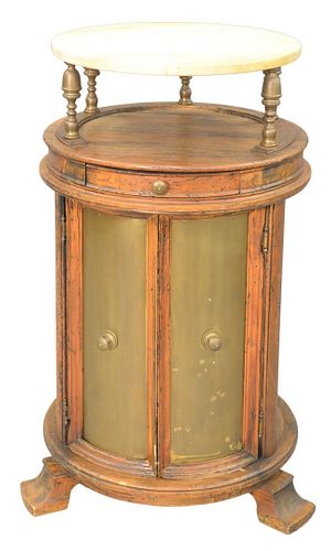 Continental Round Back Cabinet, having marble shelf on brass supports over two doors, having brass panels, height 41 inches, diameter 24 inches.