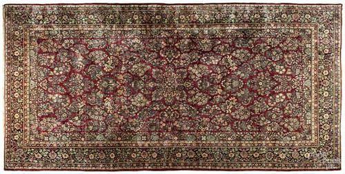 Sarouk carpet, ca. 1930, 23'4'' x 12'3''.