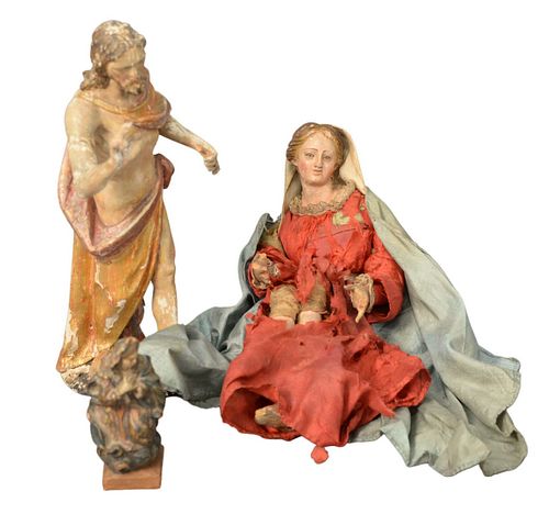Two Early Santos and Terracotta Figures, 18th century or later, both heights 11 inches.