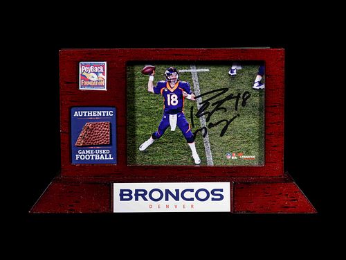 A Peyton Manning Signed Photograph and Game Used Football Fragment (Fanatics),