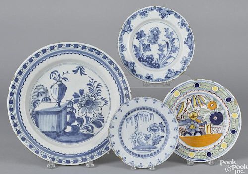 Delft blue and white charger 18th c., 13 1/4'' dia., together with two blue and white plates