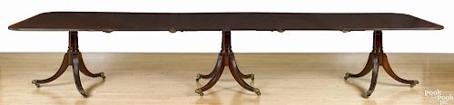 George III style mahogany triple-pedestal dining table, 29 1/4'' h., 120'' w., 48'' d.