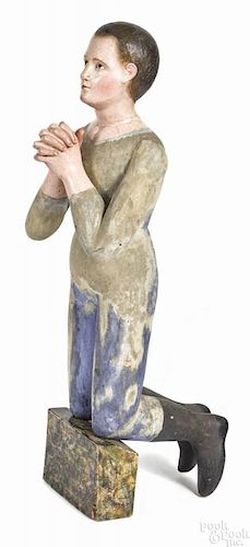 Carved and painted wood figure, late 19th c., of a young man kneeling in prayer, 34 1/2'' h.