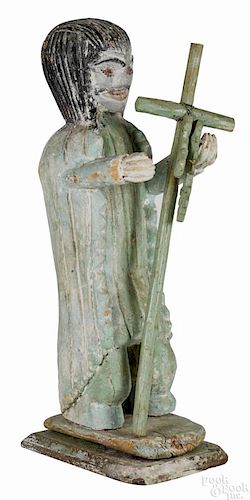 Carved and painted religious icon, 19th c., a robed figure with a mustache holding a cross