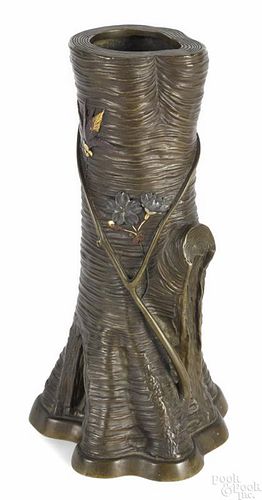 Japanese Meiji period bronze vase in the form of a tree trunk with mixed metal floral appliqués
