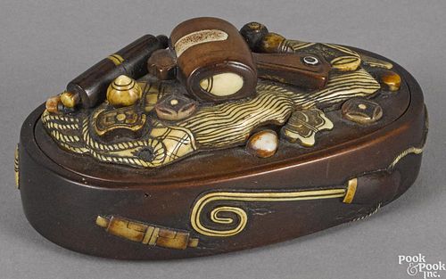 Japanese Meiji period carved boxwood and ivory mounted dresser box, 3 7/8'' l.