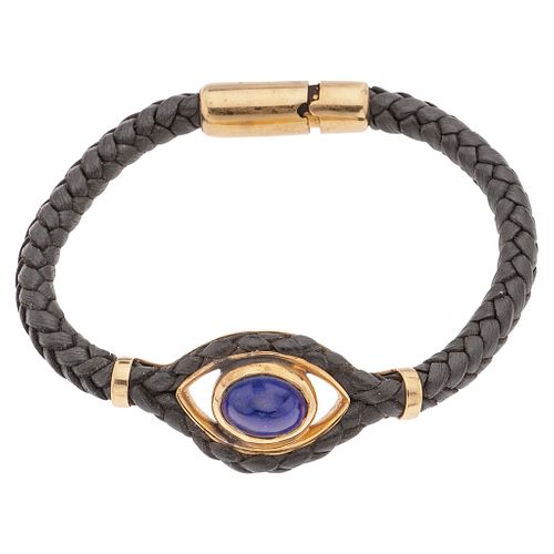 LEATHER BRACELET WITH LAZURITE AND 18K YELLOW GOLD, TANE 1 Lazurite cabochon. Weight: 22.0 g. Length: 7.2" (18.5 cm)