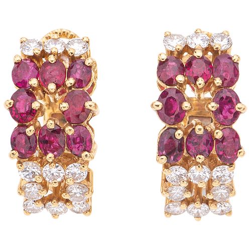 PAIR OF EARRINGS WITH RUBIES AND DIAMONDS IN 18K YELLOW GOLD 16 Oval cut rubies ~1.60 ct and 22 Brilliant cut diamonds ~0.88 ct