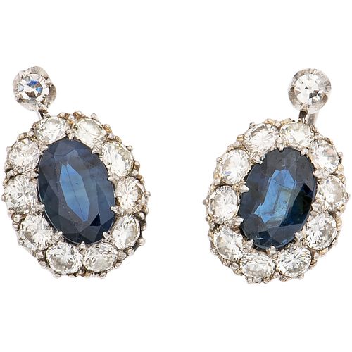 PAIR OF EARRINGS WITH SAPPHIRES AND DIAMONDS IN PLATINUM AND LATCH IN BASE METAL 2 sapphires ~1.50 ct and 22 diamonds ~1.70 ct
