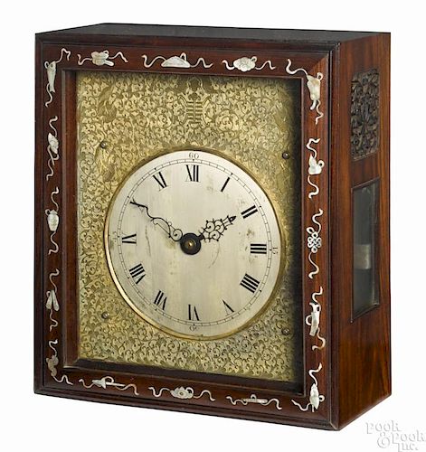 Chinese carved hardwood bracket clock, 19th c., with an elaborate cast brass bezel
