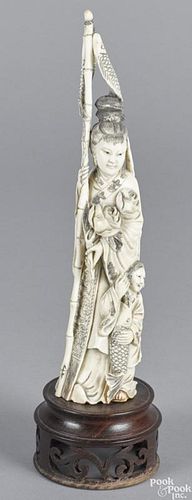 Chinese carved ivory figure of a woman and child with fish, ca. 1900, 9 1/2'' h.