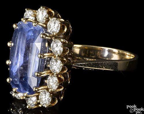 Sapphire and diamond ring, 14K gold setting with a rectangular cushion cut