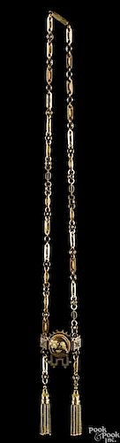 Victorian yellow gold slide chain with floral motif and two tassels, 26.9 dwt