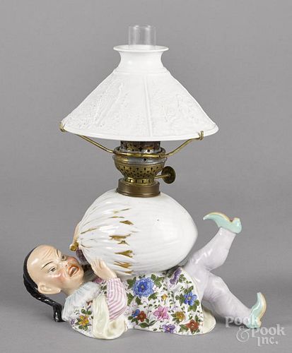 Ernst Bohne Sohne, miniature porcelain lamp, 19th c., of a Chinaman holding a nut