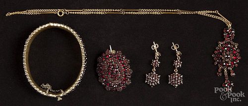 Garnet cluster jewelry with vermeil settings, to include a hinged bangle, a brooch