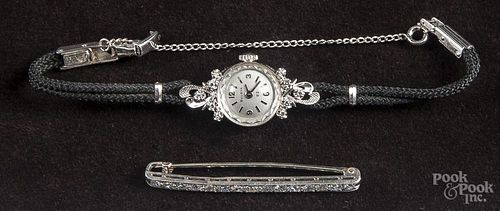 Bulova lady's wristwatch with a 14K white gold case decorated with single-cut diamond accents