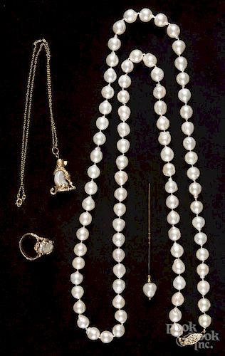 Baroque pearl jewelry, to include a strand of pearls, approximately 9mm dia.
