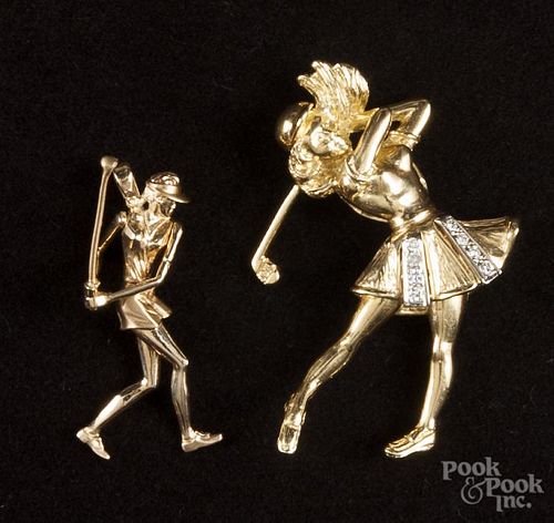Two yellow gold female golfer pendants, one with moveable legs and arms, 15.5 dwt