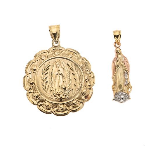 Dos medallas huecas en oro amarillo de 14k. Imagenes de Divino rostro y Virgen de Guadalupe. Peso: 13.9 g.