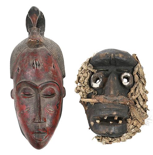Two West African Carved and Polychromed Masks