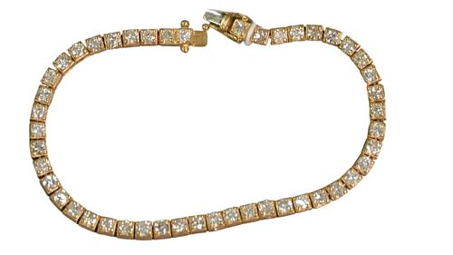 14 Karat Gold and Diamond Tennis Bracelet, set with 47 diamonds approximately .10 carats each, approximately 4 - 4.7 carats total weight, length 7 inc