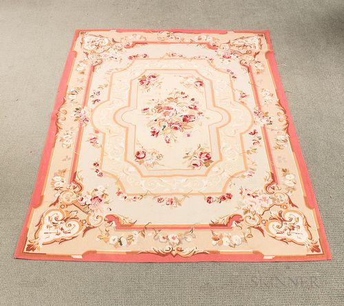Aubusson Carpet, in red, pink, ivory, green, and white on a light gray and light green field, 9 ft. 1 in. x 6 ft. 6 in.