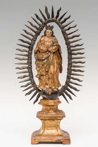 Purisima; Andalusian school; century XVIII.
Carved wood, gilded, polychrome and silver.