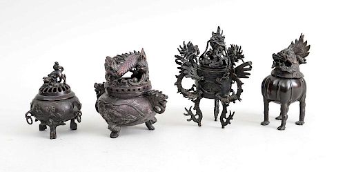 THREE CHINESE ARCHAIC STYLE BRONZE TRIPOD CENSERS AND COVERS AND A KYLIN