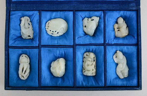 GROUP OF EIGHT CHINESE CARVED PALE GREEN JADE ARTICLES