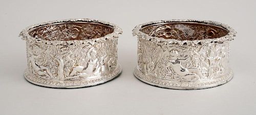 PAIR OF SILVER-PLATED BOTTLE COASTERS