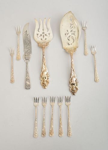 REED AND BARTON ART NOUVEAU SILVER TWO-PIECE FISH SET, NINE STEIFF OYSTER FORKS AND A SILVER-PLATED BREAD KNIFE
