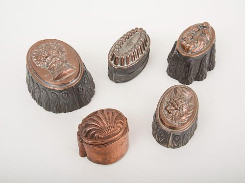 FOUR COPPER-TOP TIN MOLDS AND A COPPER MOLD