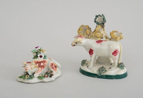 ENGLISH PORCELAIN FIGURE OF A RECUMBENT COW AND A STAFFORDSHIRE COW-FORM SPILL VASE
